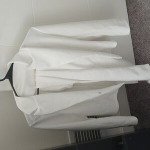 All white pants suit. Size XL more of a medium fit